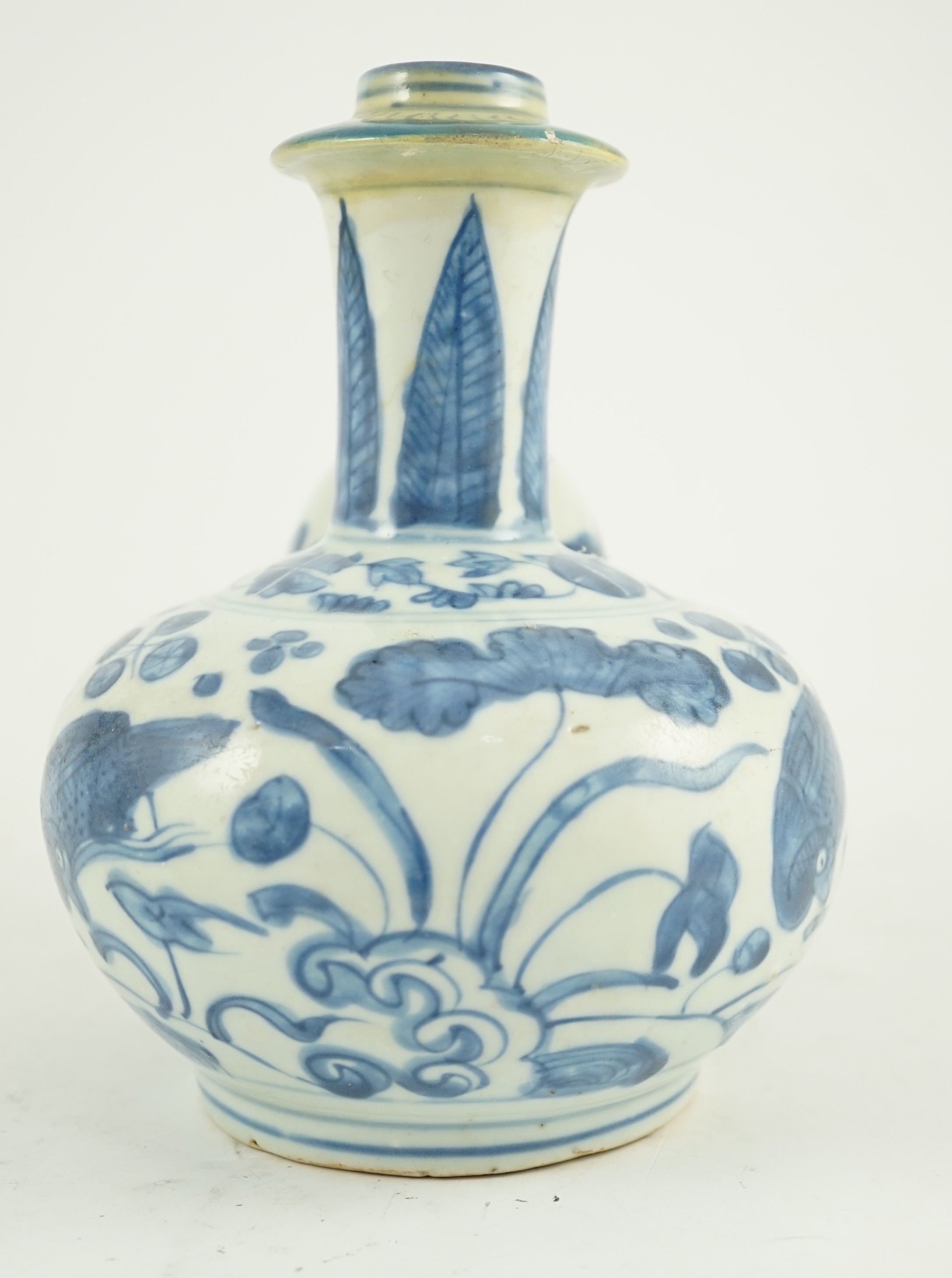 A Chinese late Ming blue and white ‘bird and lotus’ kendi, 16.5 cm high, areas of restoration